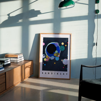 Abstract art print of Wassily Kandinsky’s “Several Circles” (1926) featuring overlapping circles in various colors and sizes against a deep, cosmic background.