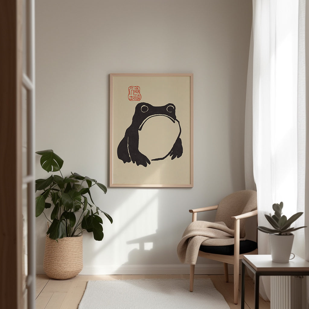 Minimalist frog silhouette art print, bold black lines on a neutral background, perfect for modern and playful decor.