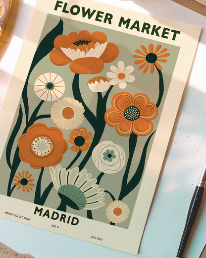 Modern "Flower Market Madrid" poster featuring orange, green, and cream flowers on a beige background. A stylish and contemporary floral art print for nature-inspired decor.