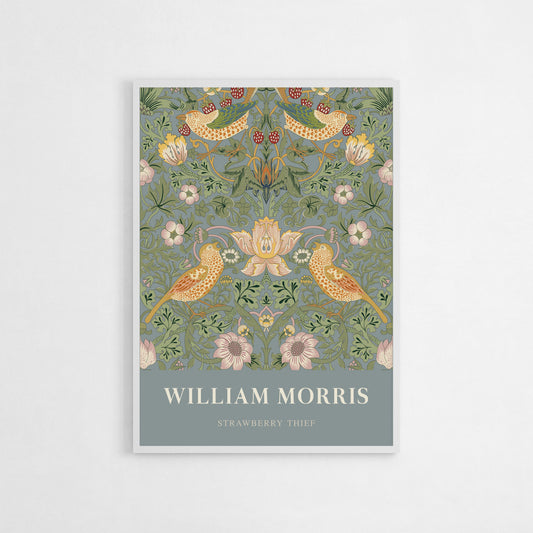 William Morris “Strawberry Thief” art print in a sage green palette, featuring intricate floral patterns and birds, encapsulating the essence of the Arts and Crafts movement.