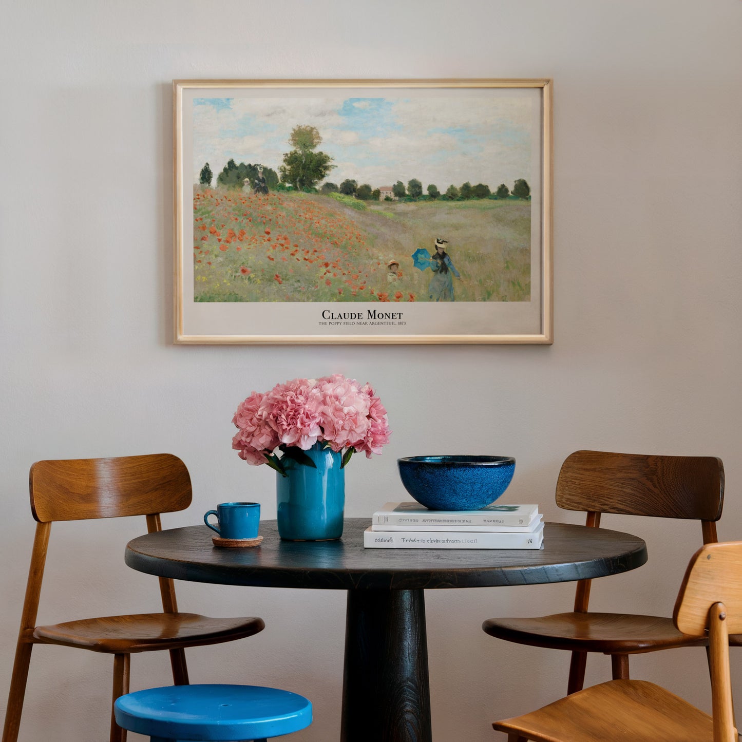 Art print of Claude Monet’s “The Poppy Field Near Argenteuil” (1873) featuring a scenic field dotted with red poppies and figures walking under a cloudy sky.