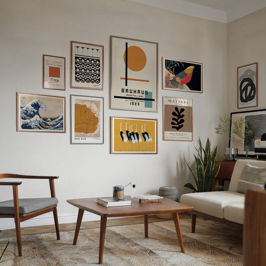 A set of 8 art posters arranged on a gallery wall, featuring pieces from Bauhaus, Picasso, Matisse, Paul Klee, Hokusai, Ogata Korin, and Ito Jakuchu. The collection showcases a harmonious blend of modernist design and classic Japanese woodblock prints.