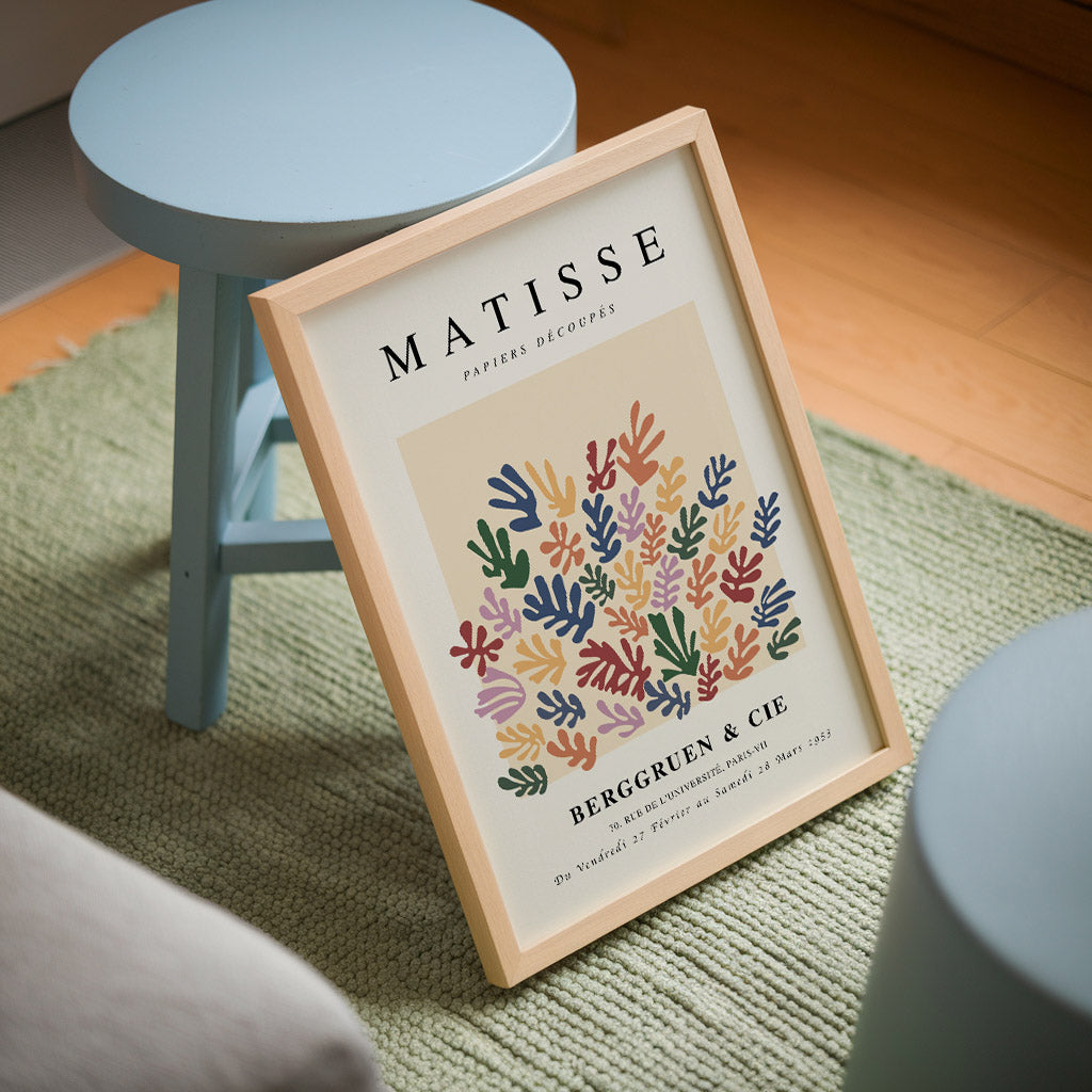 Art print of Papiers Découpés by Henri Matisse, featuring colorful abstract shapes inspired by leaves, set against a light background. Ideal for adding a pop of color and playful style to any modern interior, perfect for home decor or as a unique artistic gift.