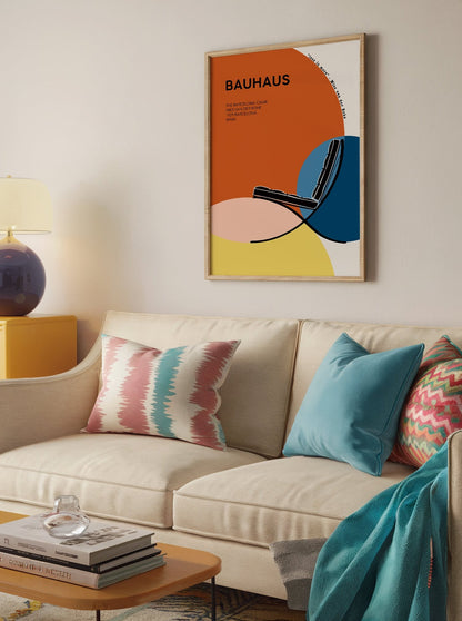 A Bauhaus poster featuring the Barcelona Chair by Mies van der Rohe, designed with geometric shapes in warm orange, blue, and yellow tones. This modernist art print adds a touch of elegance to minimalist, mid-century modern, or Bauhaus interiors. Perfect for living rooms, bedrooms, and office spaces, and makes a stylish gift for design enthusiasts.