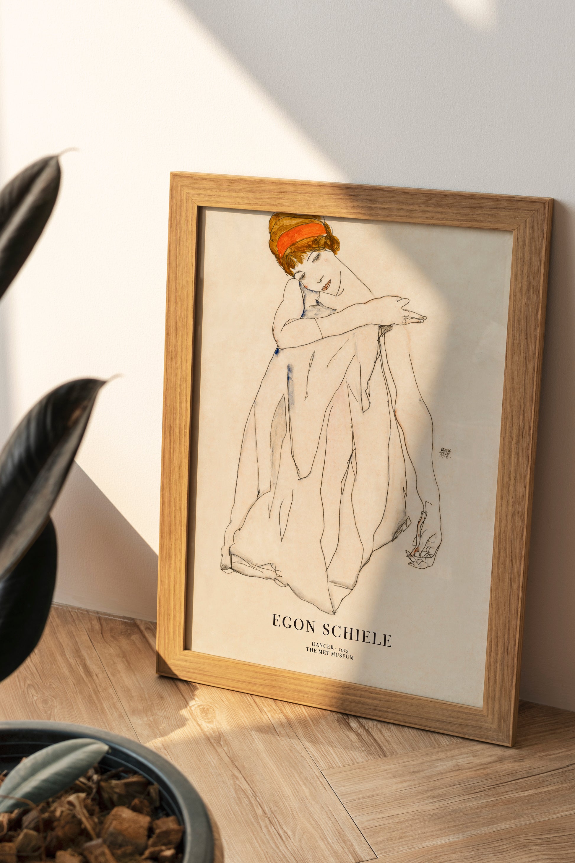 Art print of Dancer by Egon Schiele, featuring a graceful figure drawn with minimalist lines, embodying elegance and subtle emotion. Perfect for enhancing modern interiors with a touch of artistic sophistication