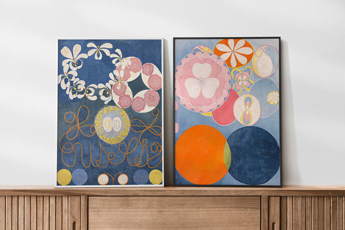 Set of 2 art prints by Hilma af Klint, The Ten Largest No. 1 and No. 2, showcasing vibrant abstract shapes, cosmic motifs, and floral elements in a symbolic representation of life stages. Ideal for modern decor and as a unique gift for art enthusiasts.