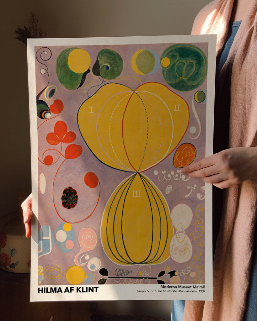 Art poster of Hilma af Klint’s “The Ten Largest No. 7: Adulthood,” showcasing large, abstract yellow and red forms surrounded by intricate details and a purple background, symbolizing the themes of maturity and balance in life.