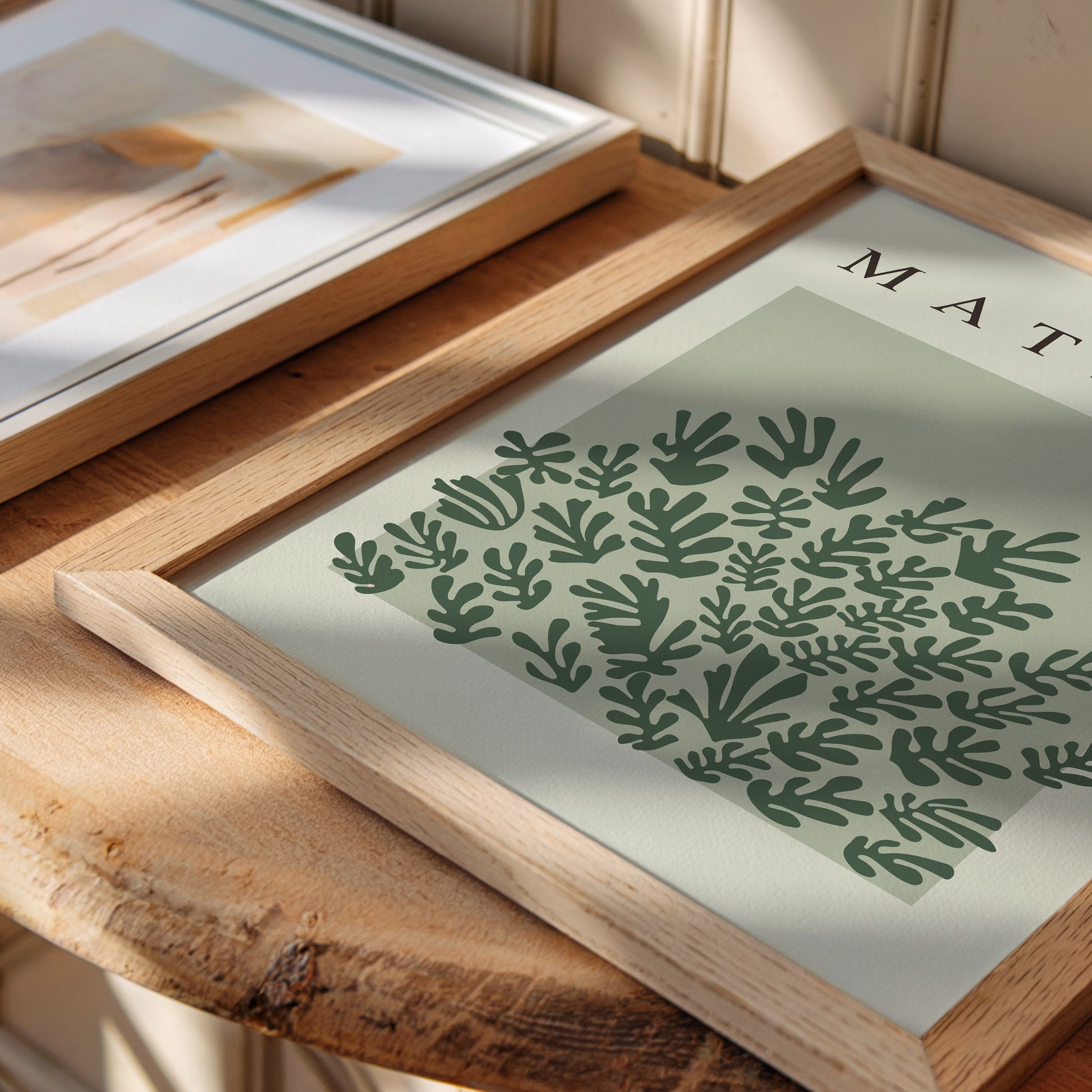 paper cutout Art print of La Gerbe by Henri Matisse, featuring leafy, abstract shapes in calming green tones. Perfect for minimalist interiors or as a sophisticated addition to a modern space, bringing natural elegance and artistic flair.