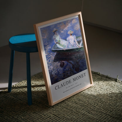 Exhibition poster of Claude Monet’s On the Boat, showcasing two women seated on a boat with serene water reflections, a classic impressionist artwork ideal for wall decor and as a refined gift for art lovers.