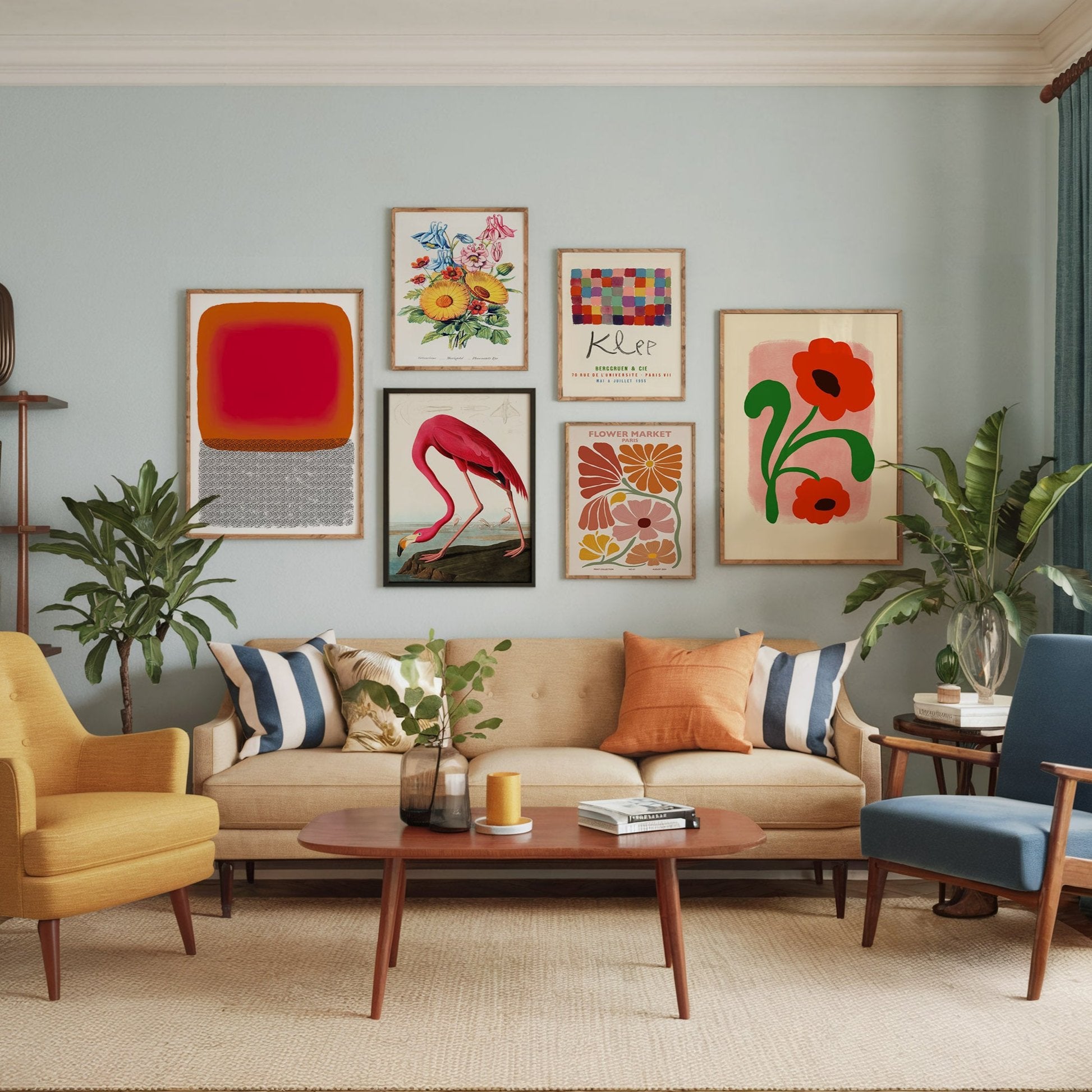 Tropical-inspired gallery wall set of six posters featuring pink and red tones, including florals, an exotic bird, and modern abstract designs, styled in a cozy living room.