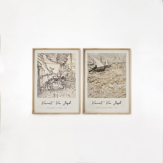 Set of two gallery wall prints by Vincent Van Gogh featuring Café Terrace at Night and Boats at Saintes-Maries. This elegant art print duo showcases Van Gogh’s sketch style, perfect for adding sophistication to home decor or as a gift.