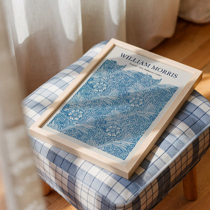 Elegant art print of Marigold by William Morris, featuring intricate blue floral patterns. This vintage-inspired piece is ideal for adding classic charm to interiors, making it perfect for living rooms, studies, or as a thoughtful gift for art and design enthusiasts.