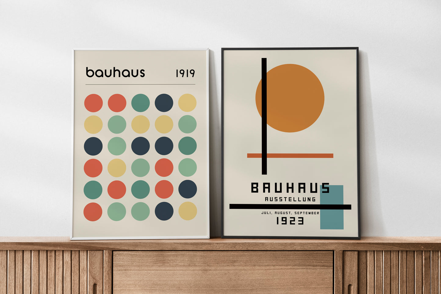 Set of 2 Bauhaus-inspired wall art prints, featuring minimalist geometric designs from 1919 and 1923 Ausstellung. The prints include bold colors and shapes, perfect for modern decor, mid century modern living rooms, offices, or as a stylish gift for design lovers.